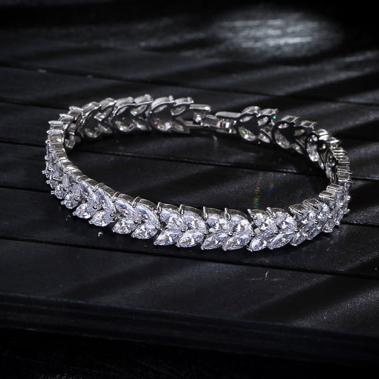 Silver tone marquise-cut tennis bracelet in titanium steel with sparkling crystal detailing