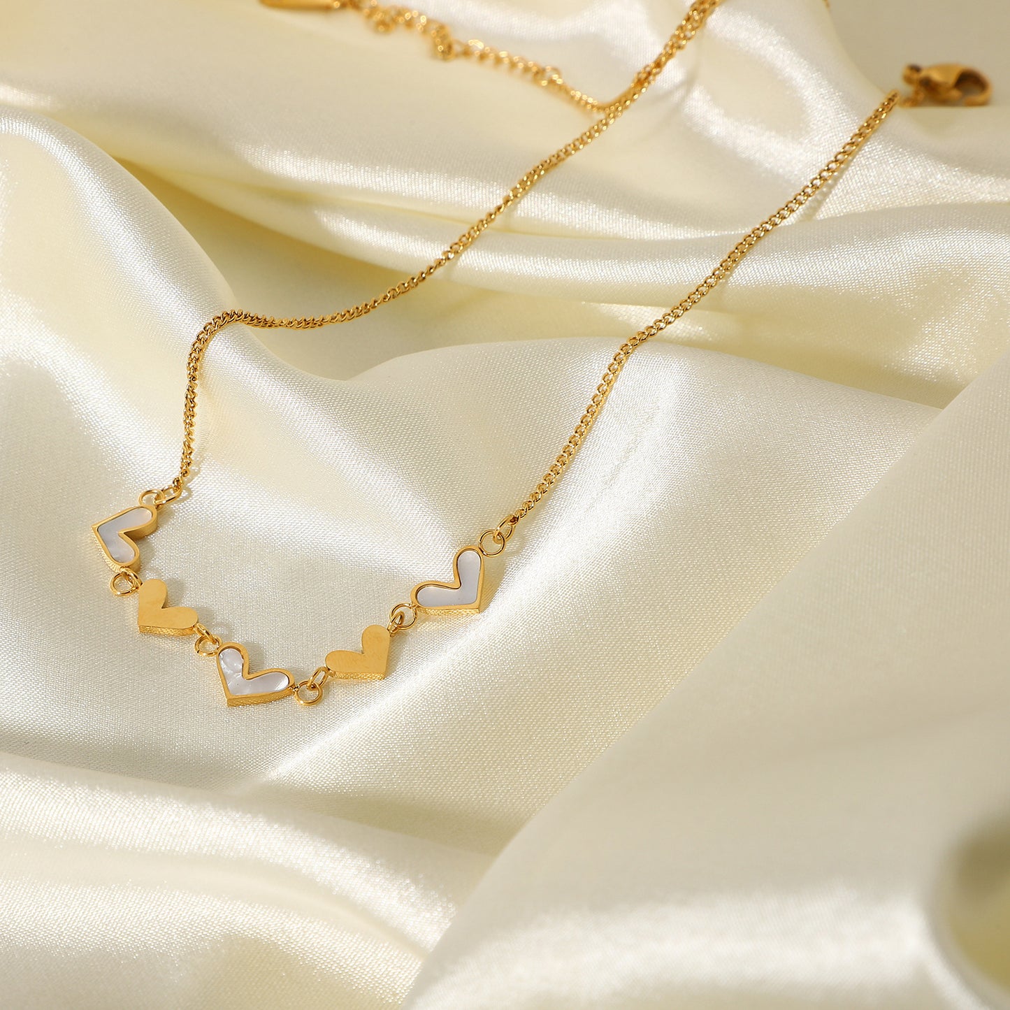 "A symbol of love, captured in the Amour Heart Necklace."
"Wear your heart with love – the Amour Heart Necklace."