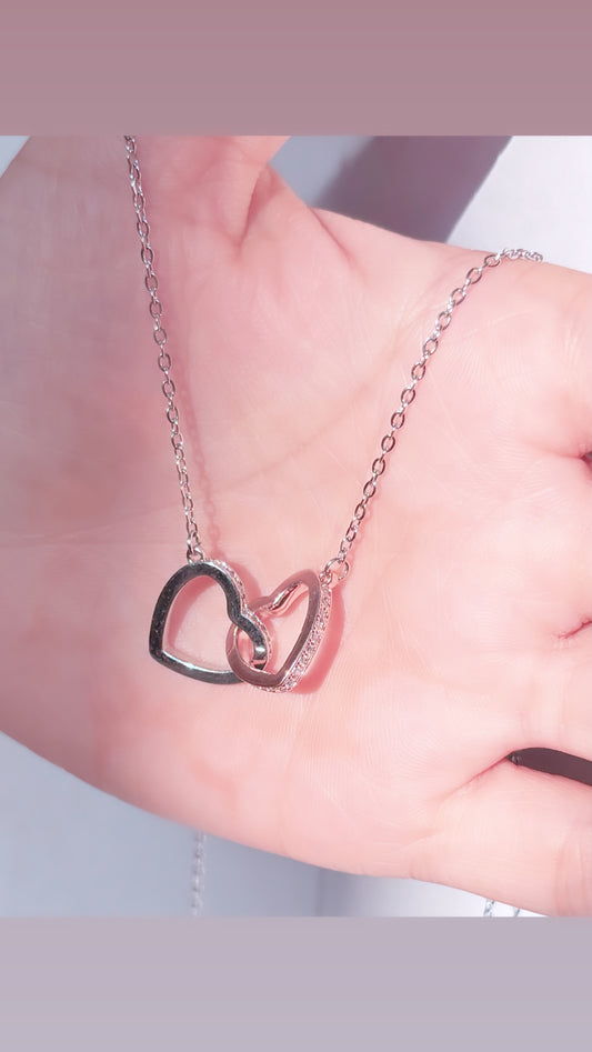 "Elegant delicate diamond heart pendant featuring a finely crafted heart-shaped design encrusted with small, brilliant diamonds.