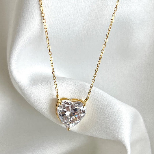 "A heart of diamonds, crafted in titanium steel."
"Timeless love, elegantly captured in a heart-shaped diamond."