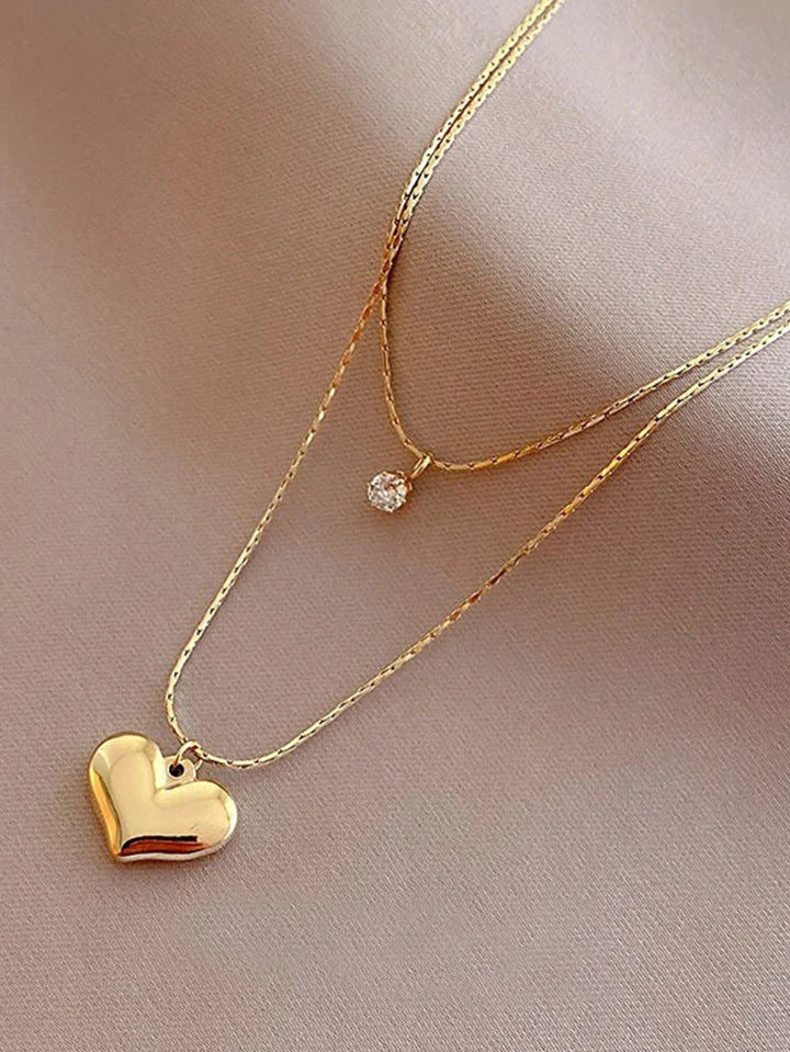 "TWO layers of love, captured in the Desirable Heart Necklace."