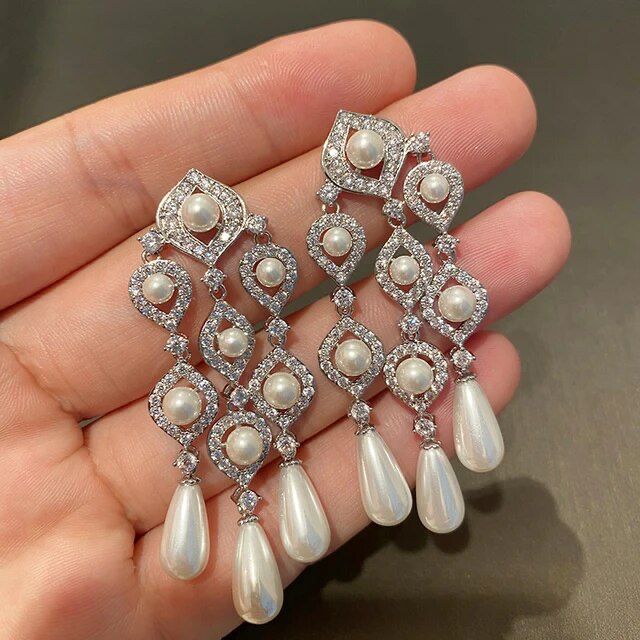 these stunning pearl chandelier earrings that stay radiant without the worry of tarnish.