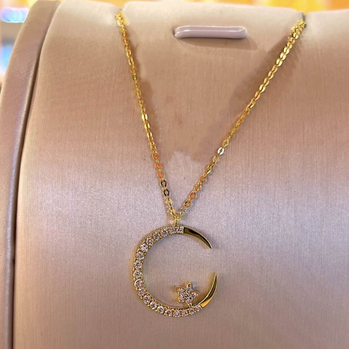 The polished silver finish adds a sleek, modern touch to this enchanting piece.