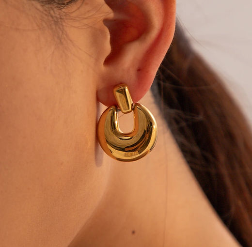 "Shiny gold jewelry designed to resist tarnishing."