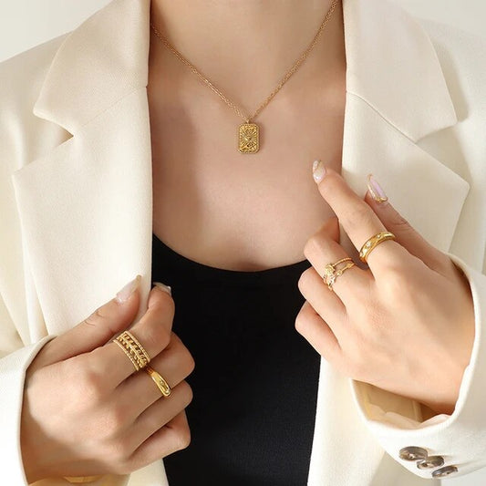 18k gold plated over stainless steel Water/Tarnish Resistant