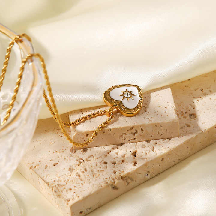 "Let your love shine with the Heart Shaped Radiance Necklace."
"Timeless love, glowing in radiant brilliance."