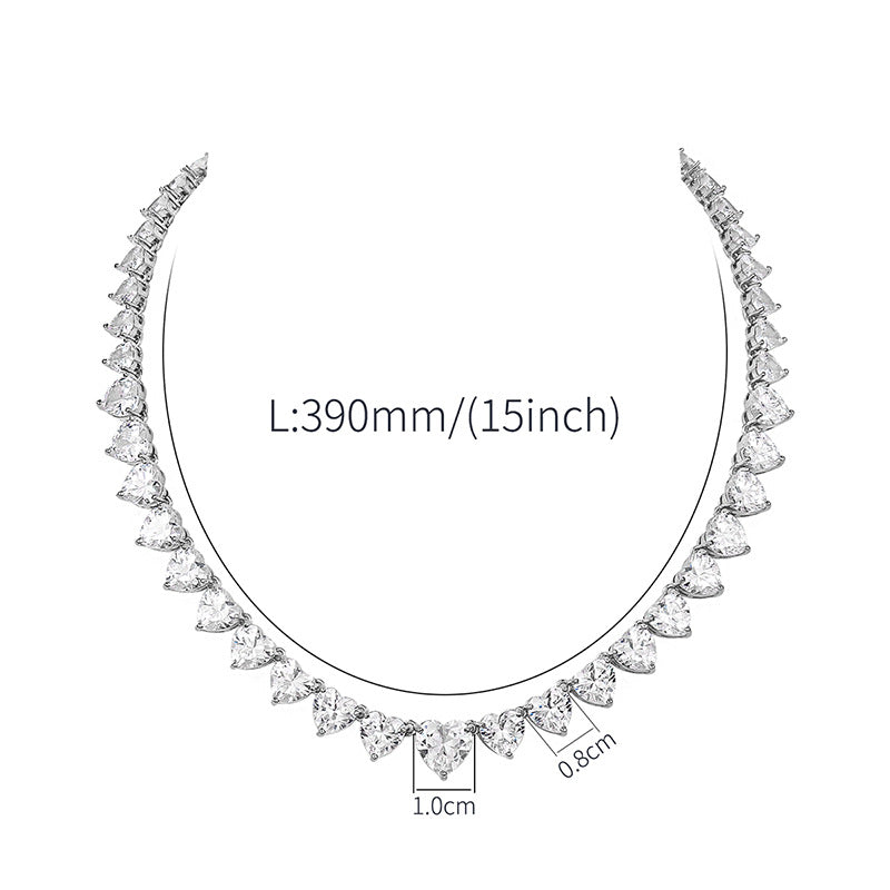 Elegant Heart Solitaire Tennis Necklace featuring a series of sparkling heart-shaped gemstones set in a continuous, seamless design.