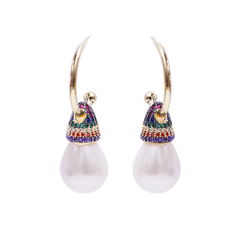 "The Multicolored Stone and Pearl Hoop Earrings combine vibrant stones with lustrous pearls for a bold and elegant statement."