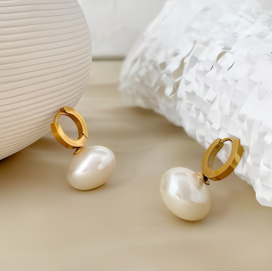 Perfect for adding a touch of refinement, these pearl hoop earrings are versatile enough to wear day or night.