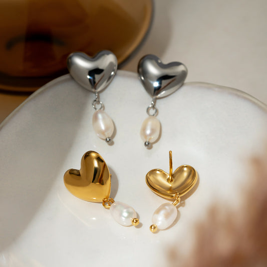 Elegant Pearl Love Earrings featuring a heart-shaped design with a central pearl.