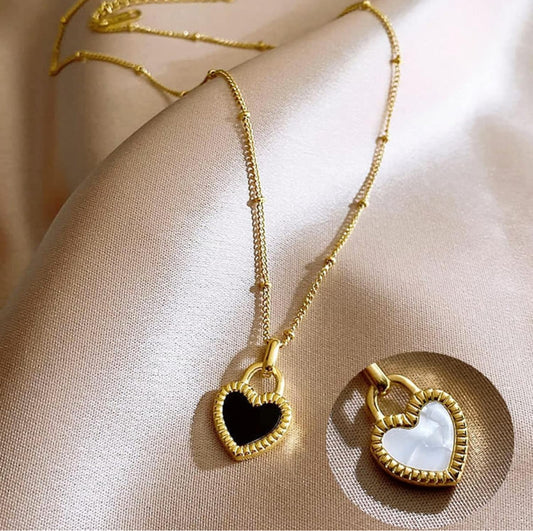 "Two styles, one necklace – the Reversible Shell Heart."