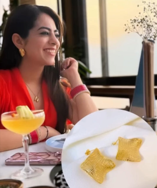 Stylish Square Crease Stud Earrings with a bold, geometric design.