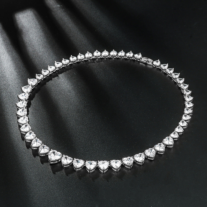 The necklace is crafted from high-quality metal, adding durability and shine to the overall design.