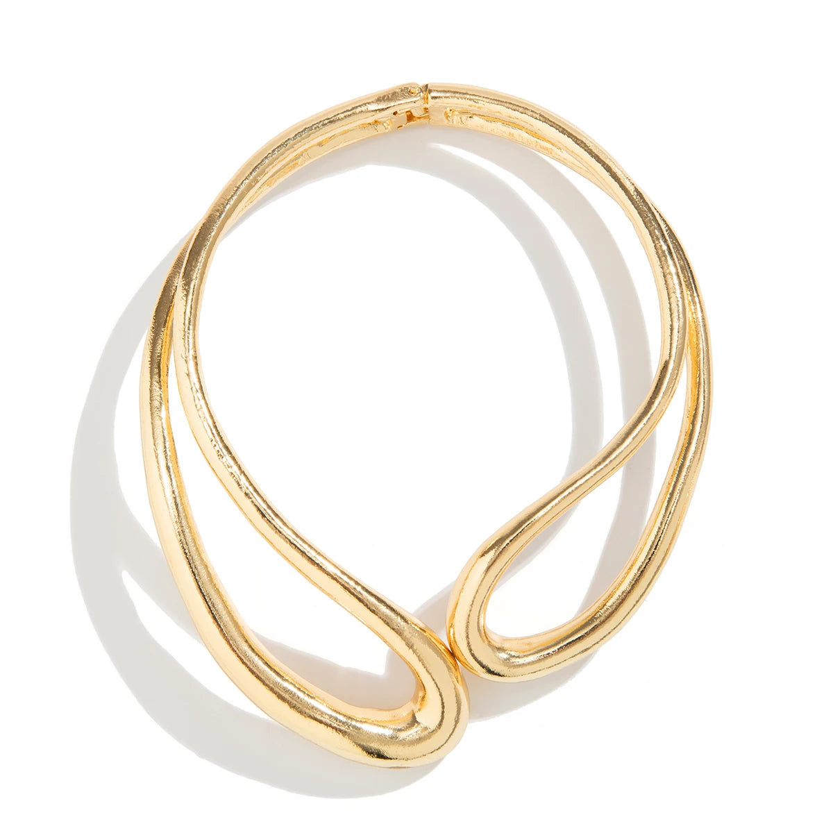 "Where gold meets grace, this necklace shines in every space."