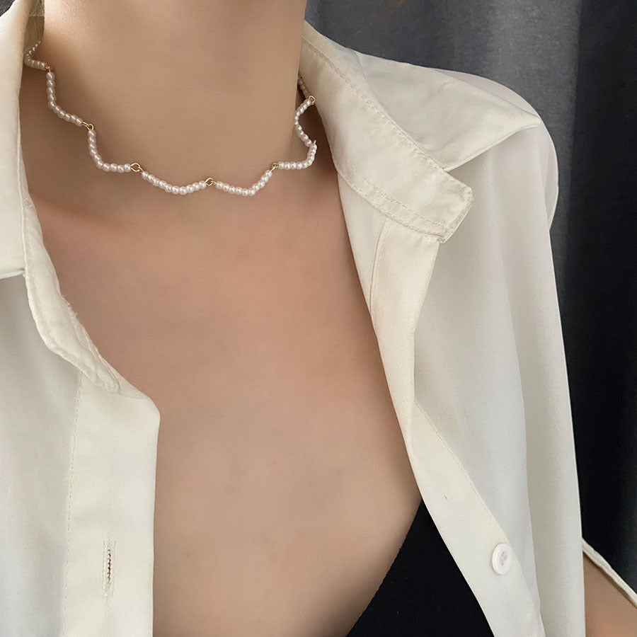 Simple and graceful pearl string necklace for women, perfect for any occasion.
