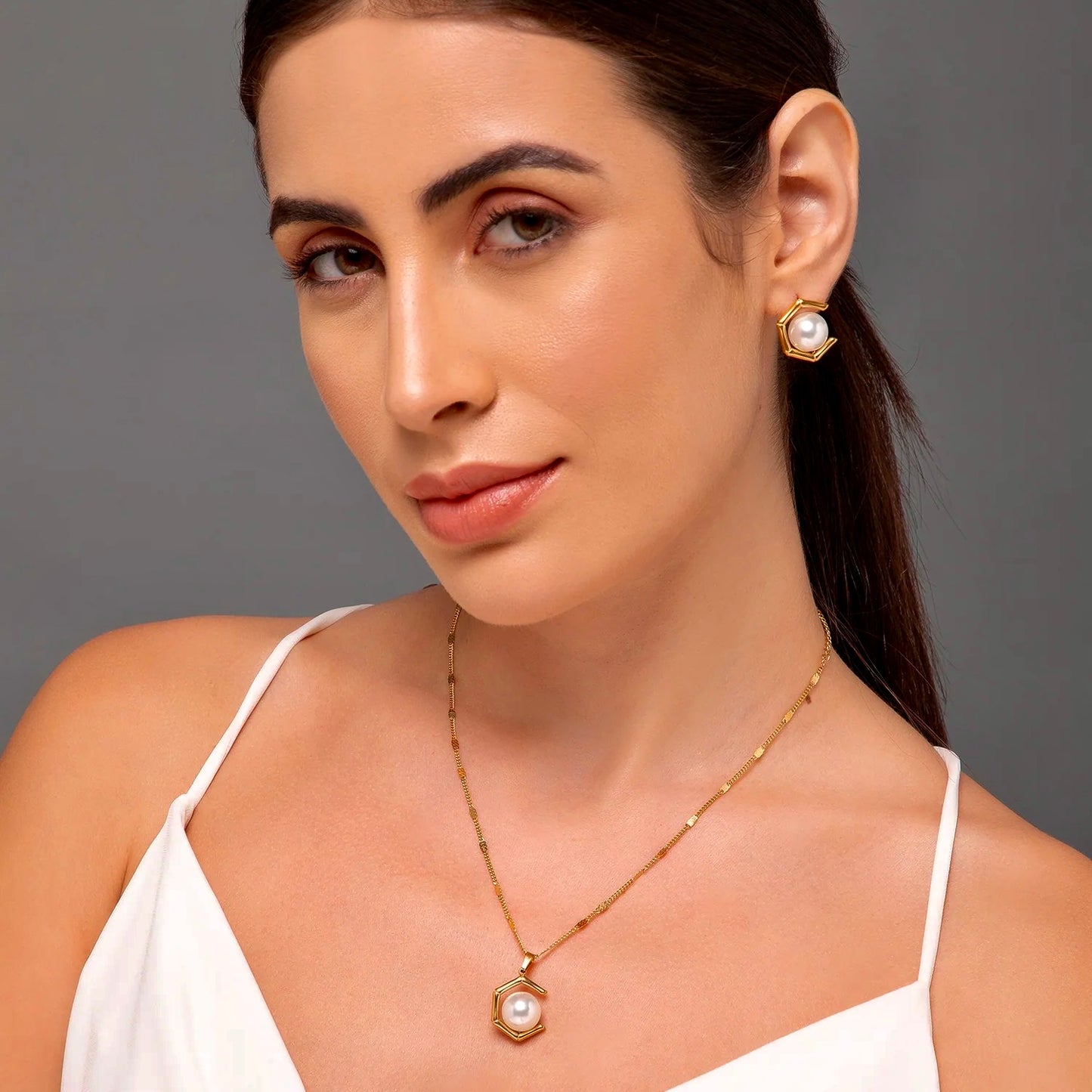 "A modern twist on timeless elegance – the Geometric Pearl Necklace Set."