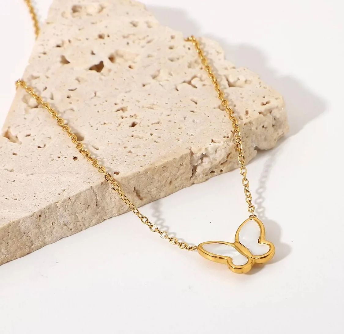 "Let your heart take flight, adorned with pearls, like a butterfly in a world of pearls."