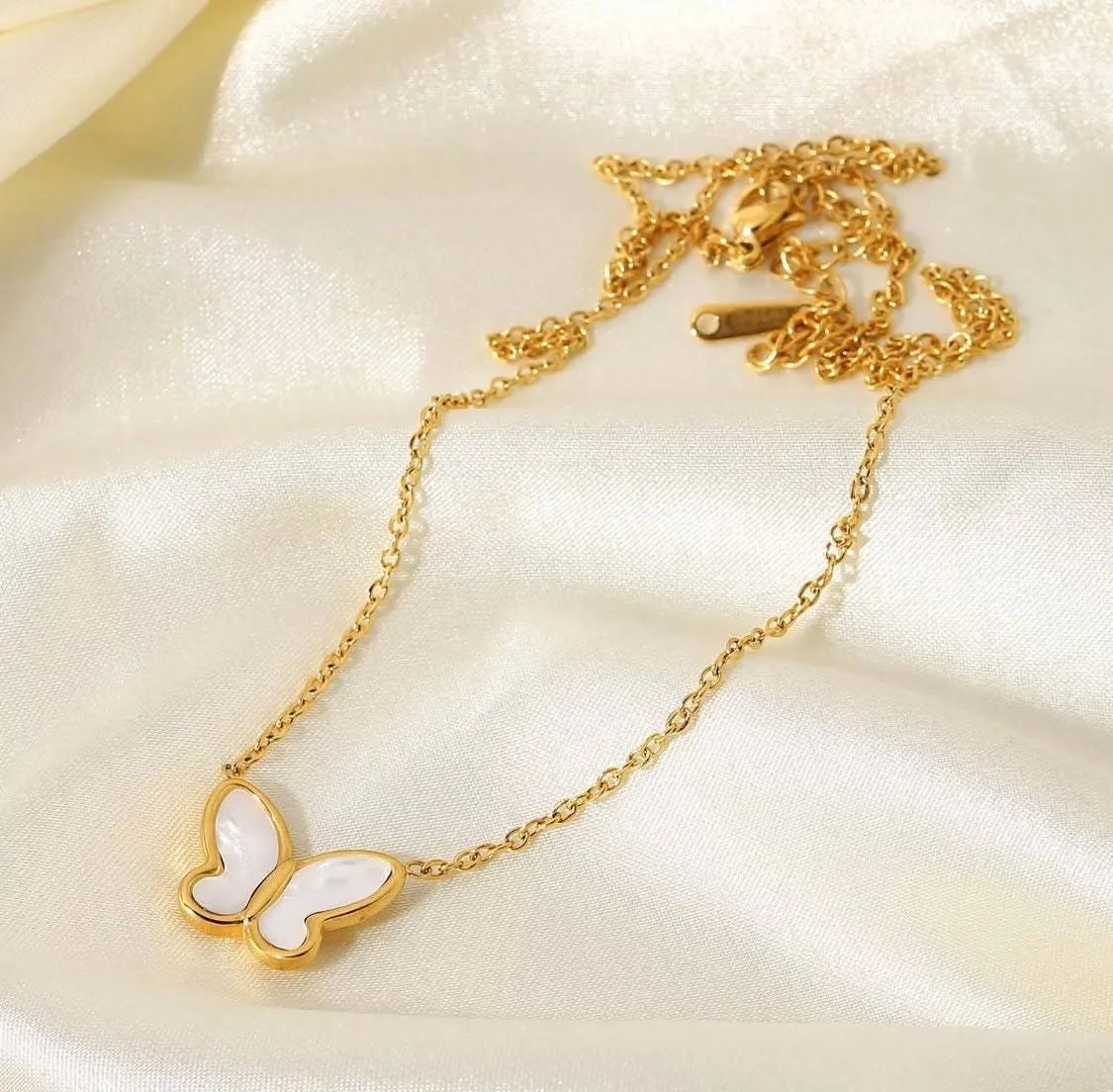 "A flutter of wings, a shimmer so bright—this pearl butterfly necklace takes your soul to new heights."