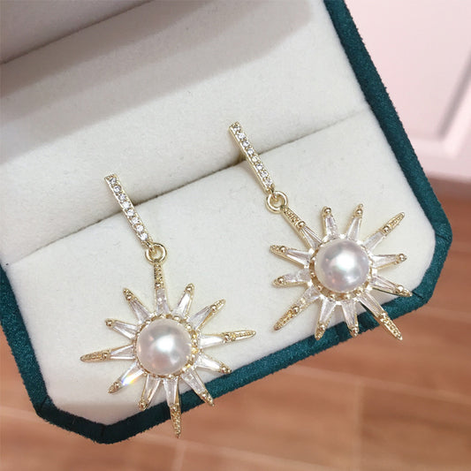 Gold Sun Pearl Drop Earrings.