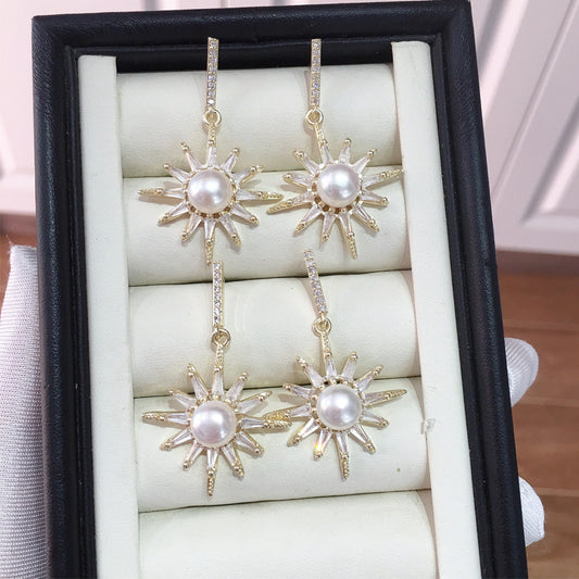 Gold Sun Pearl Drop Earrings.