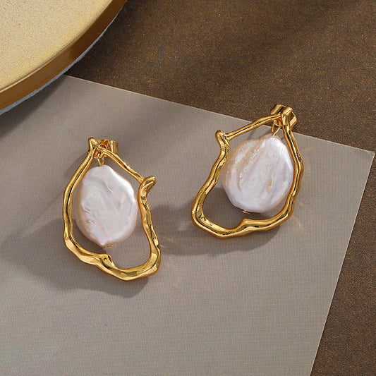 Stylish Baroque in a shell earrings for women, offering a luxurious, nature-inspired look.