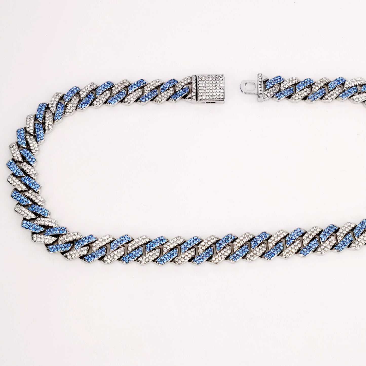 A modern, edgy twist on the classic Cuban style.
Perfect for making a statement with streetwear or upscale fits.
