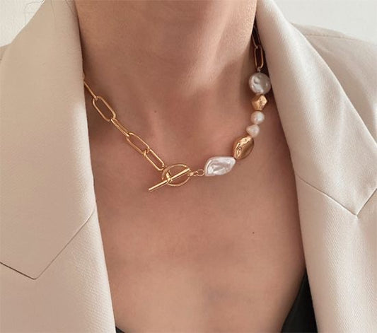 Elegant and modern, this necklace highlights the unique, irregular shapes of Baroque pearls for a sophisticated touch.