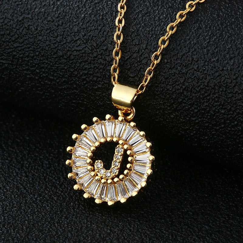 Close-up view of a stylish alphabet pendant neckpiece.