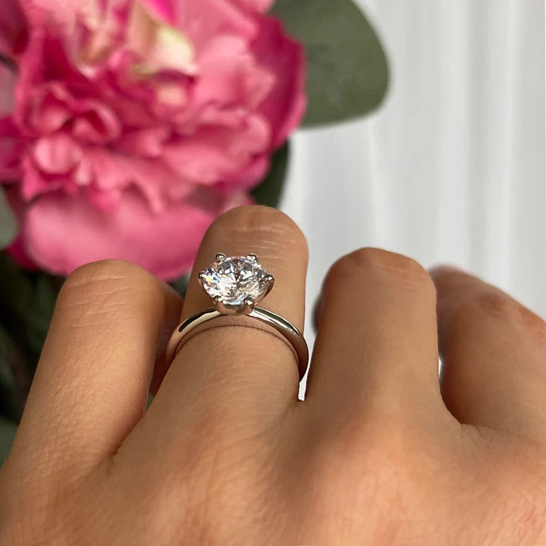 "Understated. Unforgettable. The Classic Solitaire in Pure Silver."