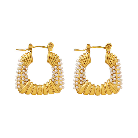 With their unique inlaid design, these earrings add a touch of luxury and sophistication to any outfit.