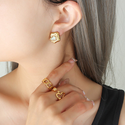 Freshwater pearl and gold abstract earrings for women.