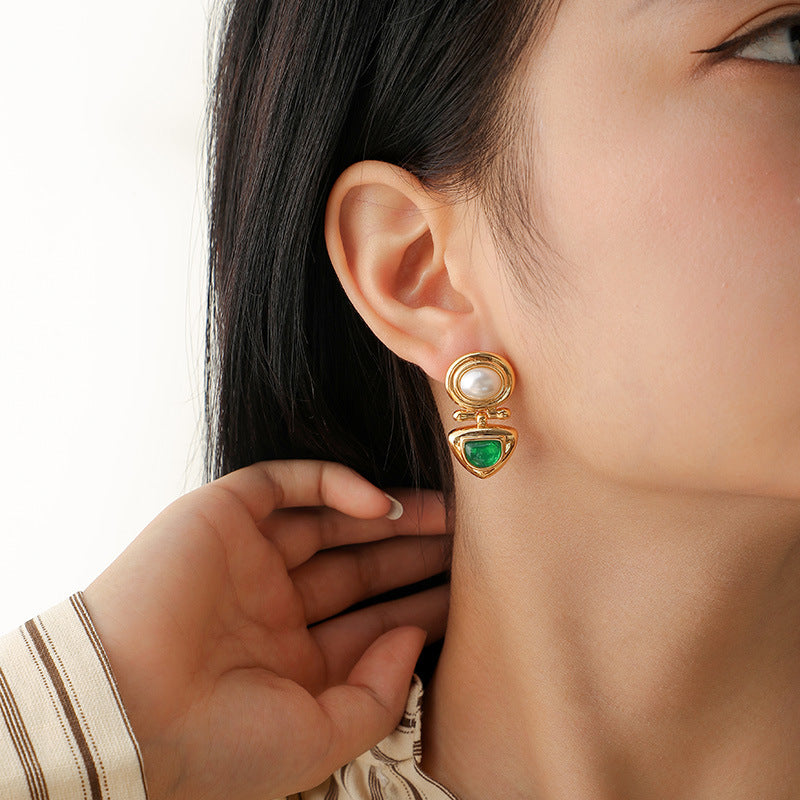 "Elegant pearl earrings with anti-tarnish technology."