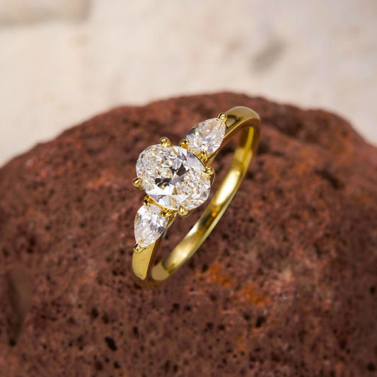 Oval Radiance Three-Stone Gold Ring
