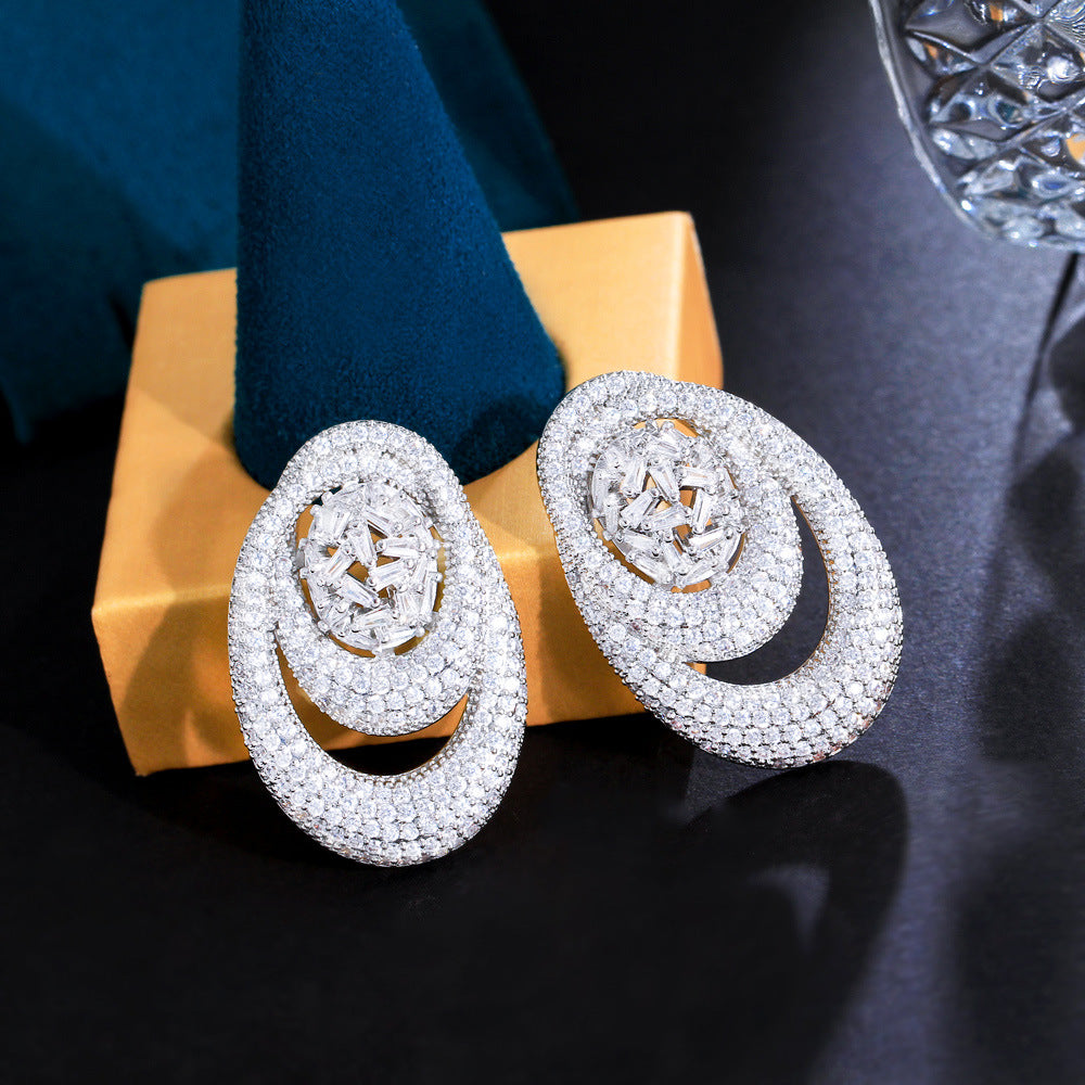 Oval Studded Diamond Earrings