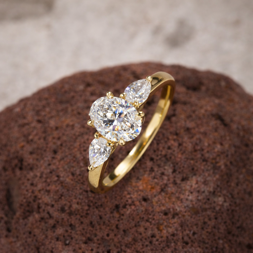 Oval Radiance Three-Stone Gold Ring