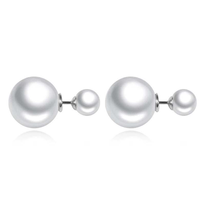 Anti-tarnish pearl jewelry, showcasing a lustrous earrings 
