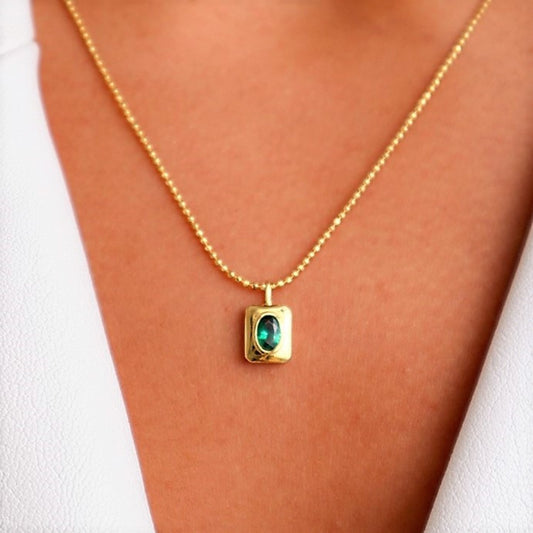 18k gold plated over stainless steel Water/Tarnish Resistant
