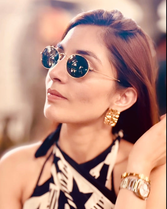 18k gold plated over stainless steel Water/Tarnish Resistant
