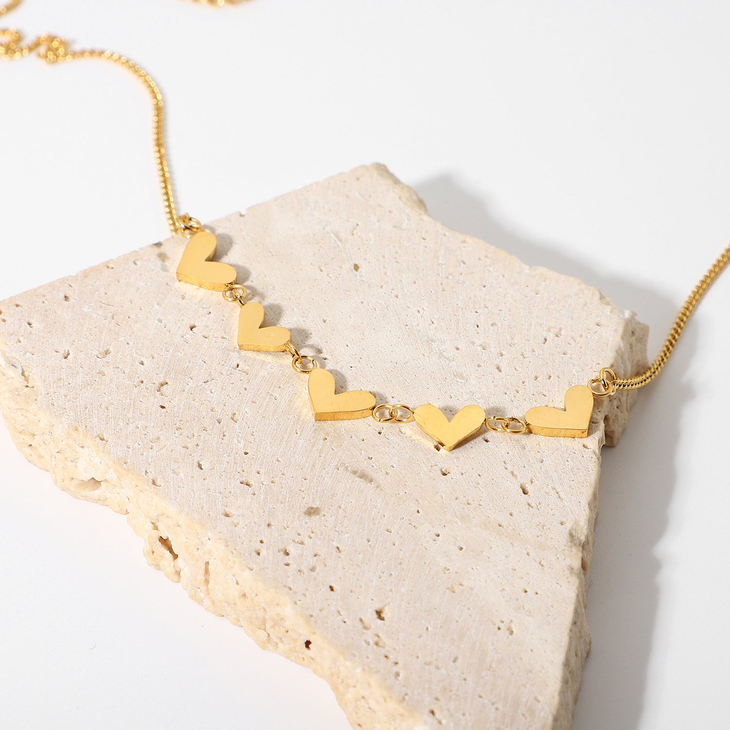 "Celebrate love, wear it close – the Amour Heart Necklace."