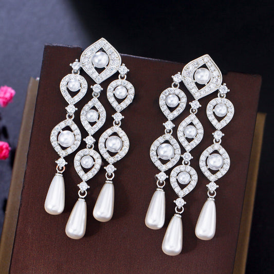 Designed to resist tarnishing, these earrings maintain their lustrous beauty and sophistication over time.
