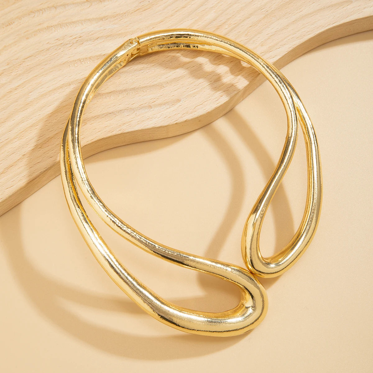 "Where gold meets grace, this necklace shines in every space."