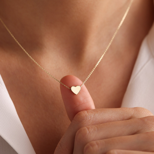 "A symbol of enduring love, in golden titanium steel."