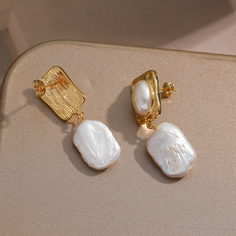 Elegant and bold, the Princess Drop Baroque Pearl Earrings are a perfect statement piece for those who appreciate individuality and luxury.