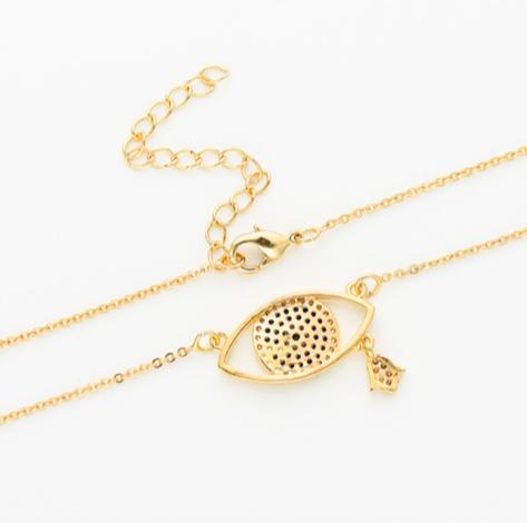 A protective talisman necklace symbolizing good luck, focus, and warding off negativity.