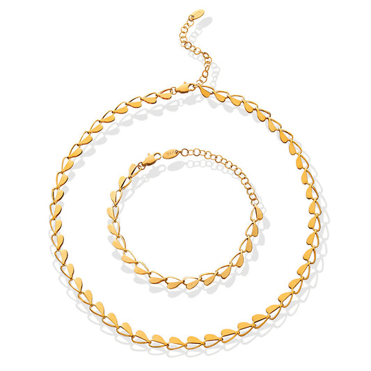 A matching necklace and bracelet set with intricate braided design.