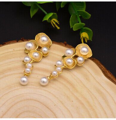 "These earrings offer a luxurious design with the added benefit of anti-tarnish protection, keeping your pearls shining bright."