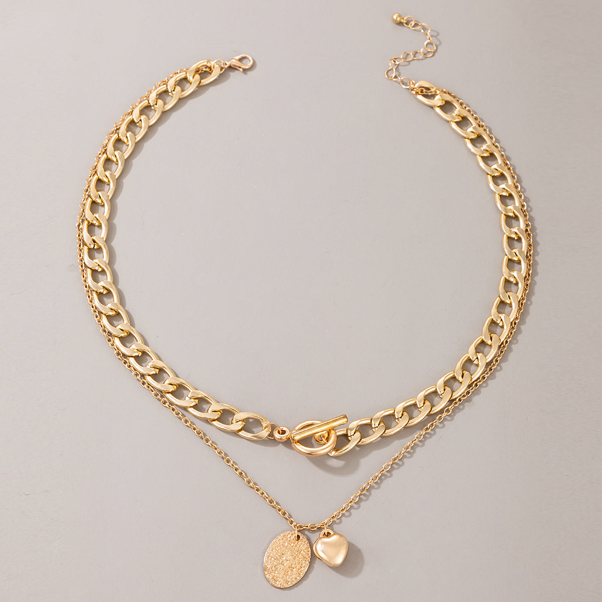 Both chains have a soft, radiant gold finish that catches the light.