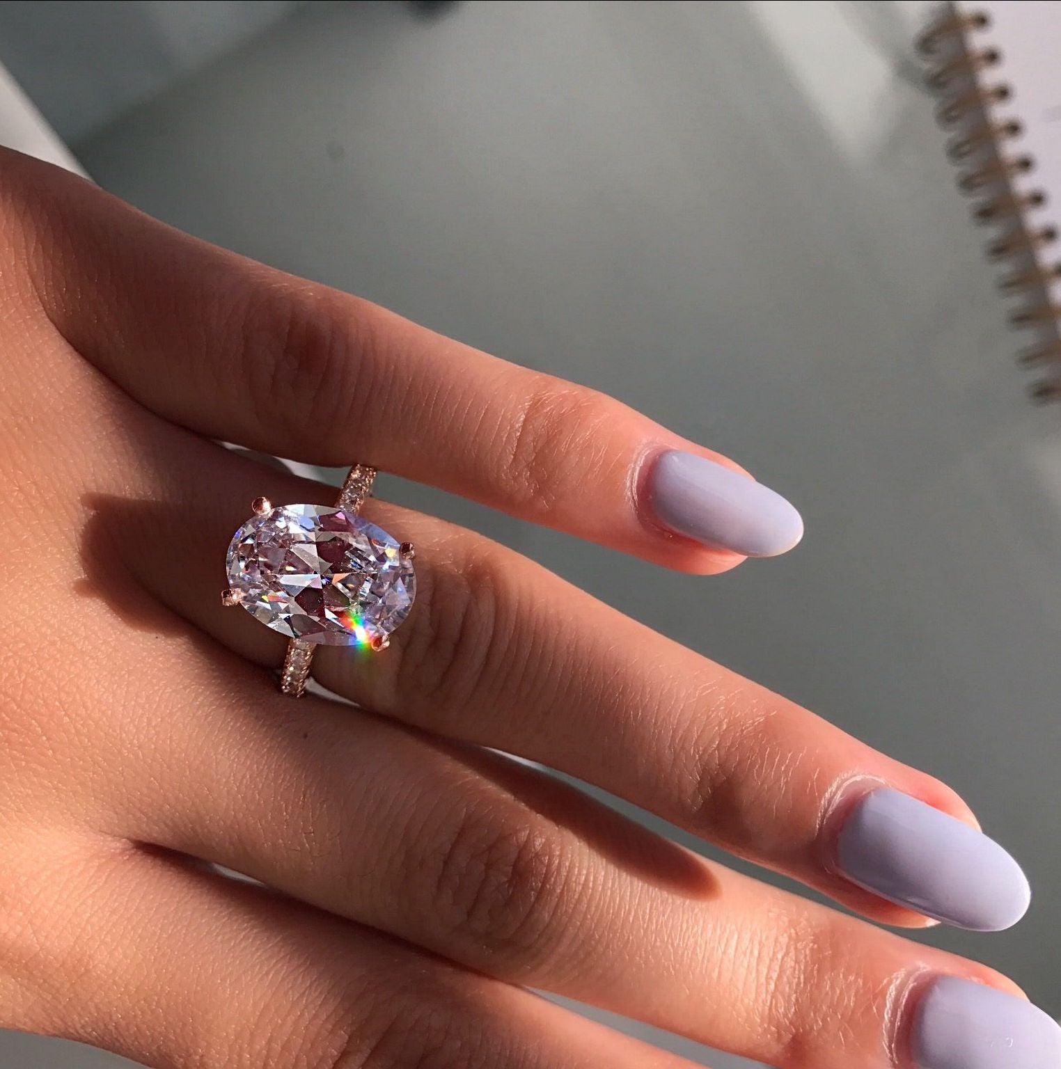 "A timeless silhouette – Oval Diamond Ring, Hallmarked for Purity."