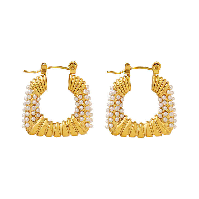 With their unique inlaid design, these earrings add a touch of luxury and sophistication to any outfit.