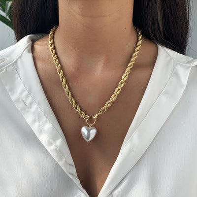 "Pure elegance, captured in a white heart pendant."

"A symbol of love, glowing in a white heart design."

